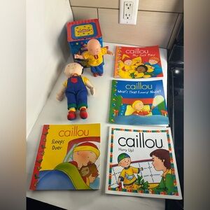 Vintage Caillou lot featuring 2 dolls, jack-in-the-box and 4 books